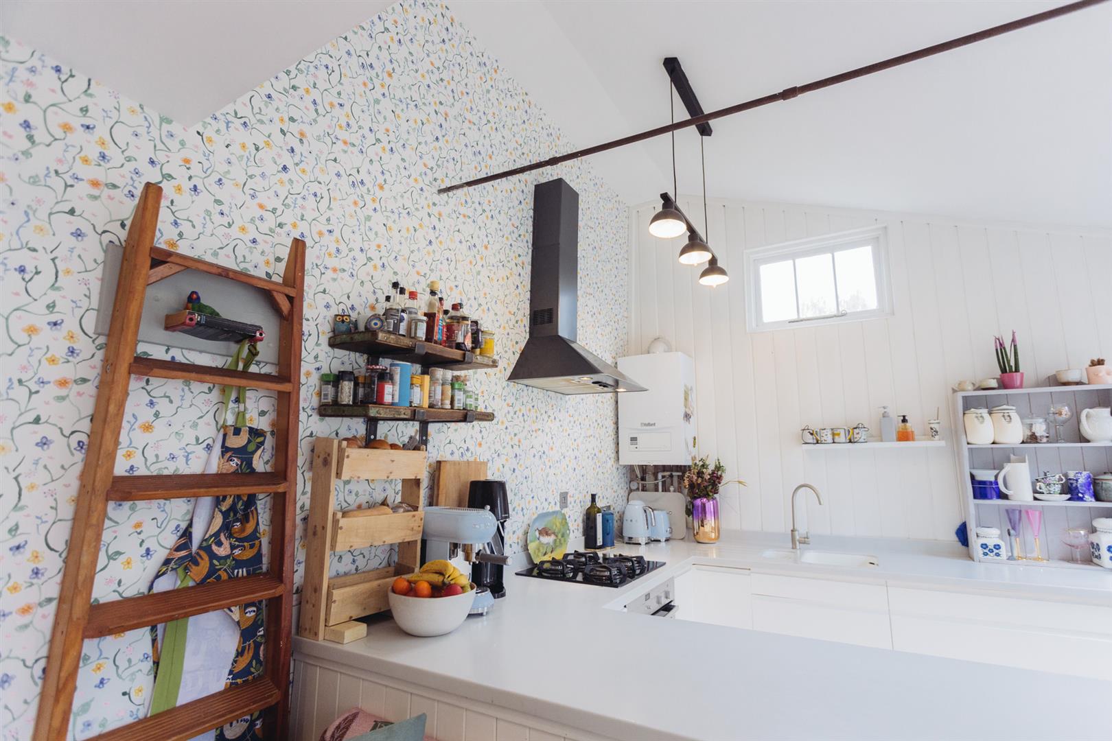 Photo of a farmhouse style kitchen with skylight that was recently sold here at Davies & Davies.